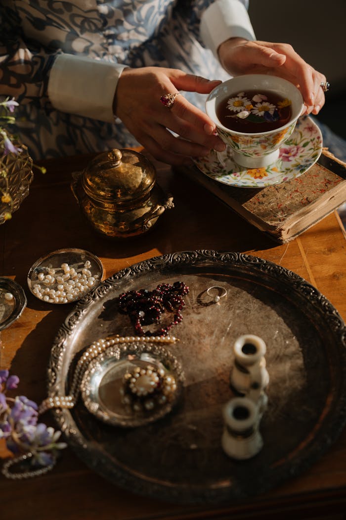 why-choose-us A classic tea scene featuring vintage porcelain, jewelry, and an elegant atmosphere, exemplifying Russian cultural style.